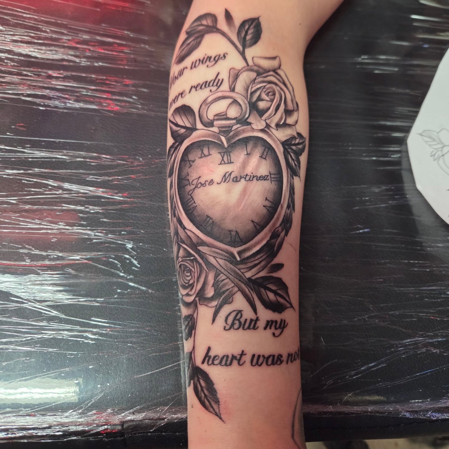 Black and grey heart pocket watch with roses memorial forearm tattoo