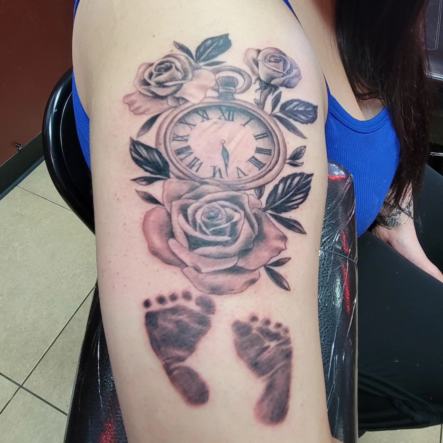 Pocket watch with roses and baby footprints memorial tattoo