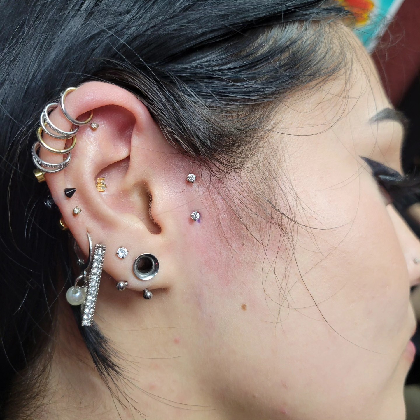 Curated ear piercing project with stacked cartilage jewelry